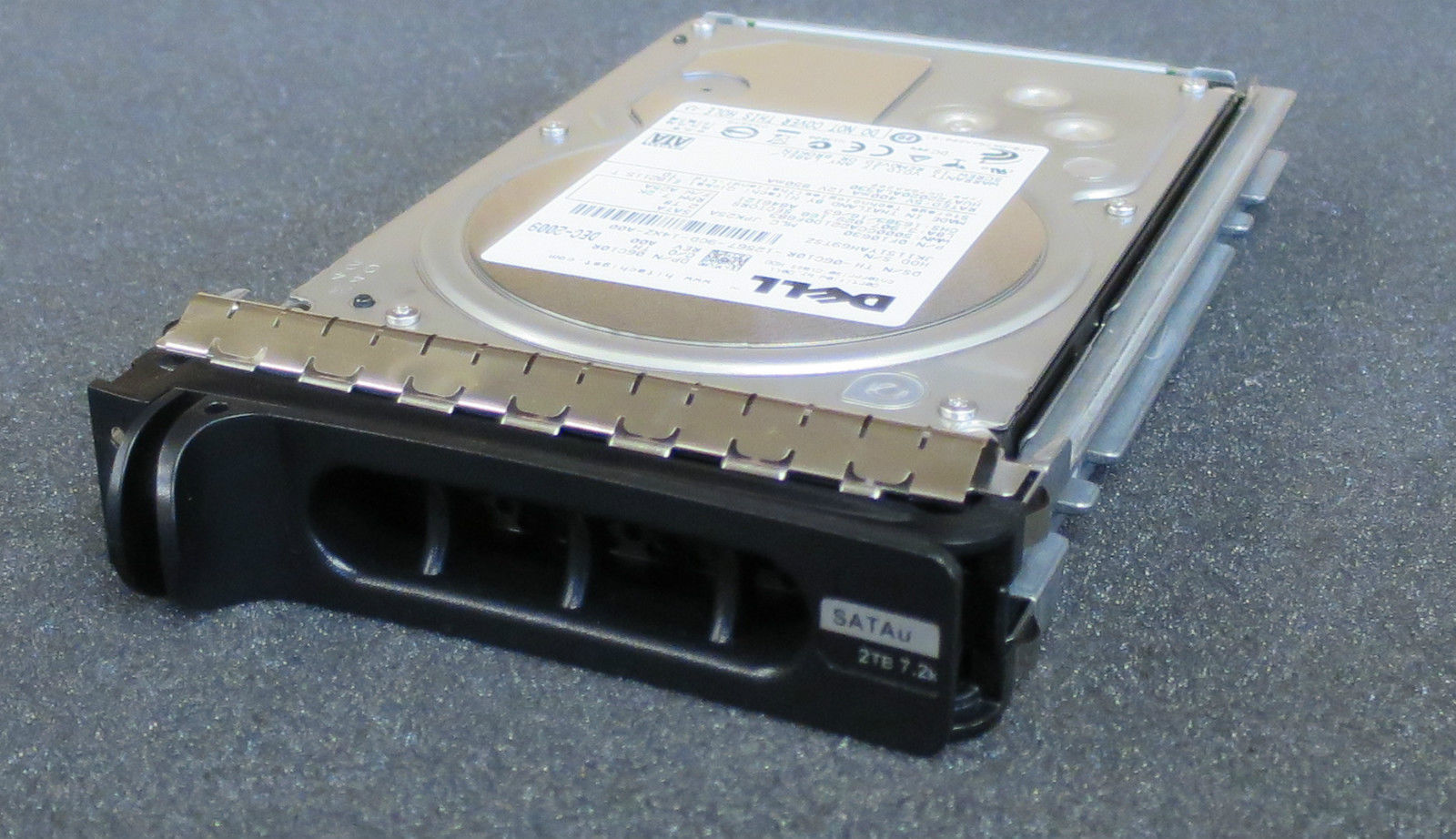 Dell Certified 2 TB 7200 RPM 3.5 inch Enterprise Class Serial ATA (SATA) Hard Drive W/ Tray for PowerEdge Servers. Mfr. P/N: 6C10R